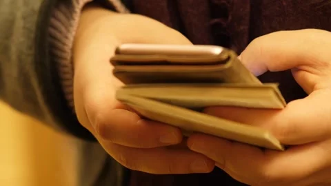 Smartphone Writing Notes on a Small Notebook – Animated Stock Footage 307466018