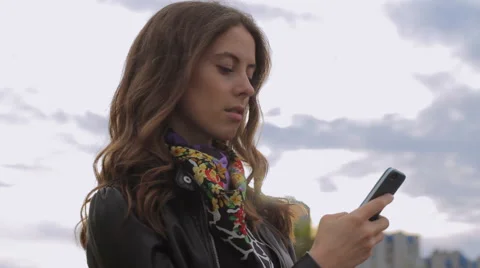 Smartphone, young woman texting using app on mobile cell smart phone Stock Footage 63166609