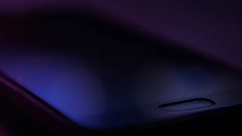 Smartpone lying on a table and suddenly a call rings. Male finger touches screen Stock-Footage 120407152