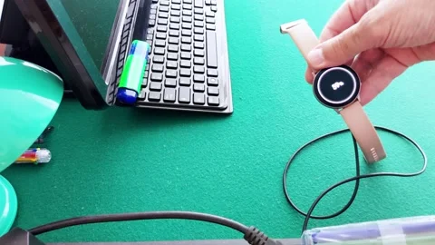 Smartwatch in Focus: A Modern Desk Setup with Subtle Details 스톡 동영상 313721179