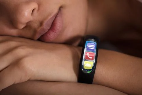 Smartwatch On Sleeping Woman's Hand Foto stock