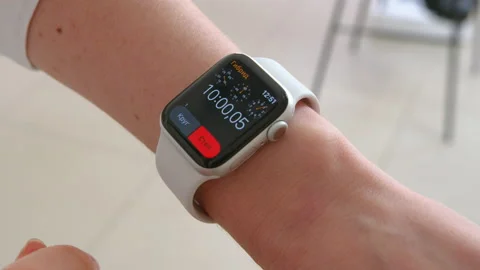 Smartwatch. Young woman using smart watch. Closeup of female touching touch Stock Footage 146787253