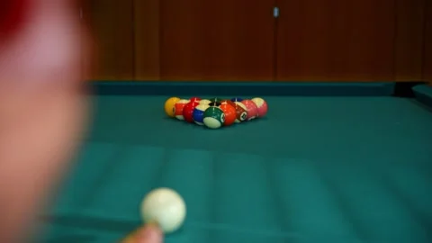 Smash the billiard pyramid of collared balls. Snooker player kicks the ball i Stock Footage 203855298