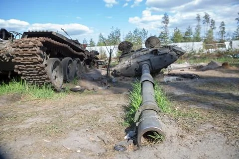Smashed and burned russian tanks. Burned tank. War in Ukraine. Stock Photos