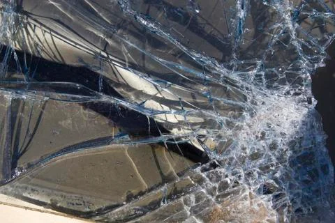 Smashed auto glass close up Stock Photos