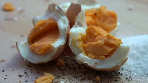 Smashed eggs salt and pepper 4k Stock Footage 171023889