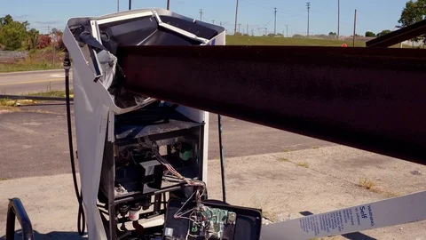 Smashed gas station pump from falling bu... | Stock Video | Pond5