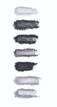 A smashed, gray toned eyeshadow make up palette isolated on a white background Foto stock