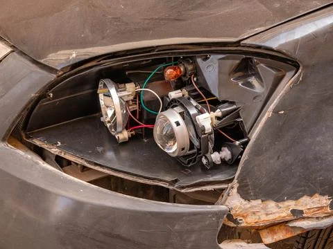 Smashed Headlight. Close-up of a smashed headlight on a car. 写真素材