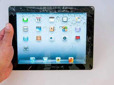 Smashed ipad digital tablet Nicosia, Cyprus ? January 19, 2012: Front of a... Stock Photos