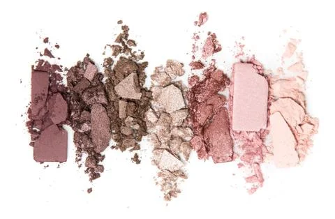 A smashed, neutral toned eyeshadow make up palette isolated on a white Stock Photos