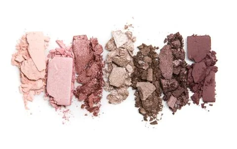A smashed, neutral toned eyeshadow make up palette isolated on a white Stock Photos