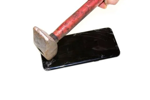 Smashed the phone with a hammer on a white background Stock Photos