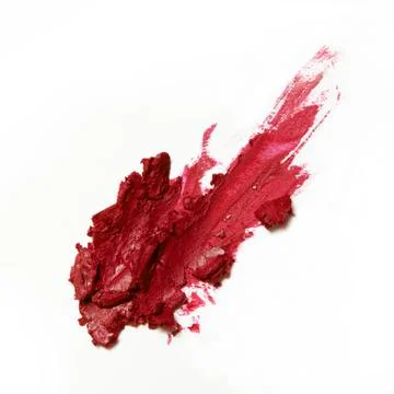 Smashed red lipstick on white background Stock Photos