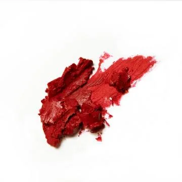 Smashed red lipstick on white background Stock Photos