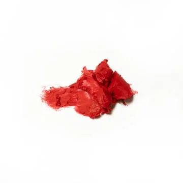 Smashed red lipstick on white background Stock Photos