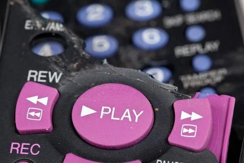 Smashed remote control Broken remote control with focus on play button Cop... Stock Photos