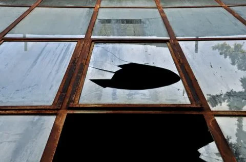 Smashed rusty windows Stock-Fotos