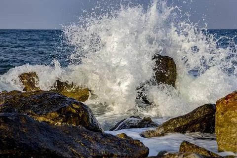 Smashed sea waves smashed on rocks. beauty water spray Copyright: xZoonar.... Stock Photos