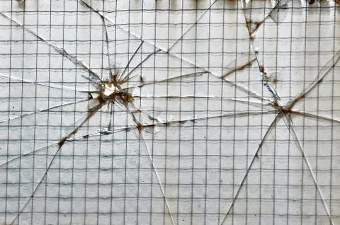 Smashed wire glass squares background 写真素材