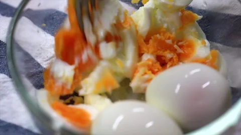 Smashing Boiled Eggs Stock Footage 131416174