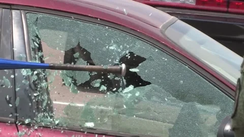 Smashing Car Window Stock Footage 283503347