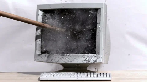 Smashing a computer with  sledge hammer Stock Footage
