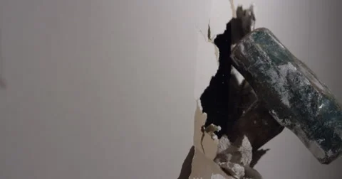 Smashing through Drywall in slow motion Stock Footage 62765658