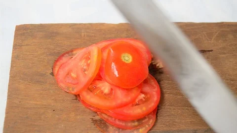 Smashing tomato with sharp knife Stock Footage 119295069