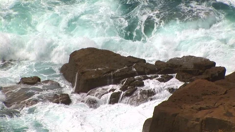 Smashing waves breaking on rocks in Cornwall, England Stock Footage 101490544