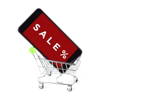 Smatrfon in a shopping trolley with the inscription SALE, isolate on white. Stock Photos
