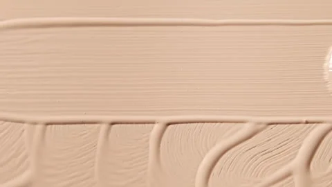 Smear foundation face make-up cream or beige concealer smudge Stock-Footage 328984717