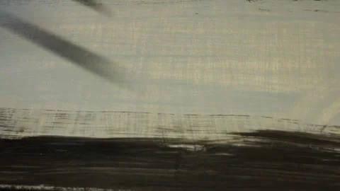 To smear it with black Stock Footage 303810169