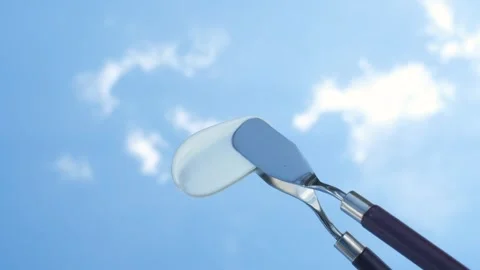 Smear of moisturizing against background of sky and clouds. Stock Footage 340713415