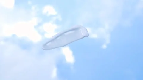 Smear of moisturizing cream against background of sky and clouds, top view. Stock Footage 315733902