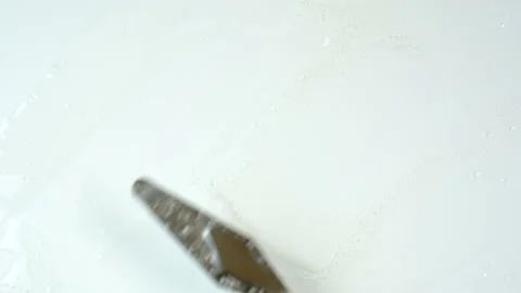 Smear of moisturizing shower gel using spatula on white background. Stock Footage 221967442