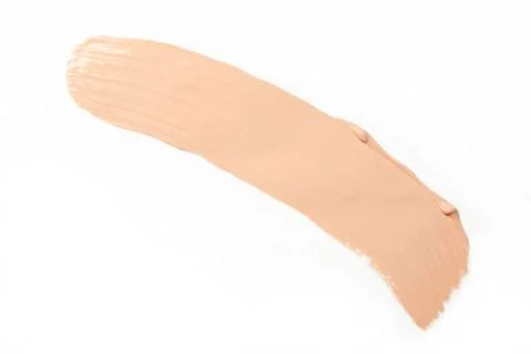 Smeared foundation on white background Stock Photos