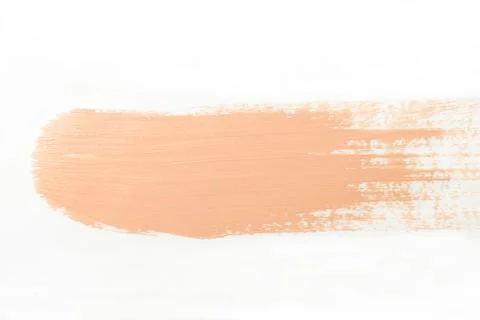 Smeared foundation on white background Stock Photos