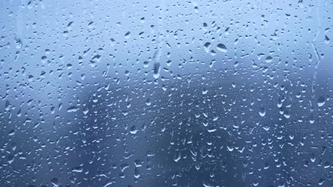The smeared smudges of raindrops close-up 動画素材 220570858
