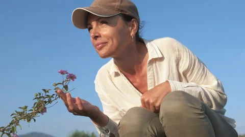 Smell the flowers. 動画素材 233120780