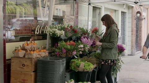 Smelling flowers Stock Footage 64887215