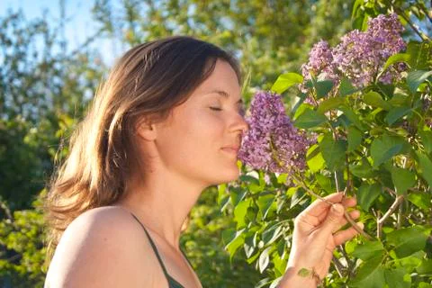 Smelling a lilac Stock Photos