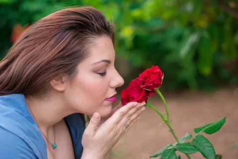 Smelling the roses Stock Photos