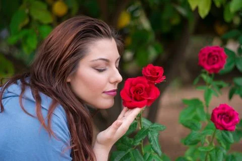 Smelling the roses Stock Photos