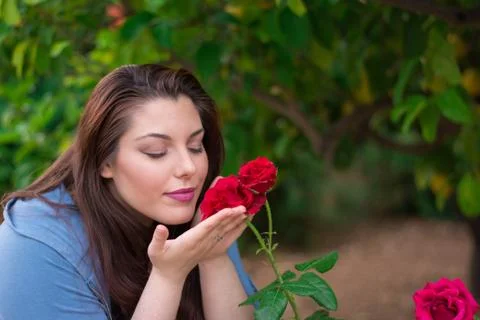 Smelling the roses Stock Photos