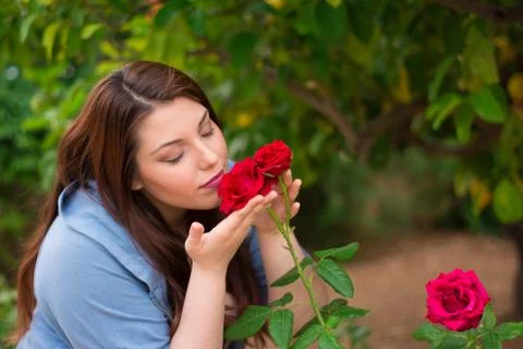 Smelling the roses Stock Photos