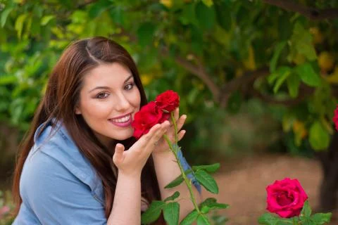 Smelling the roses Stock Photos