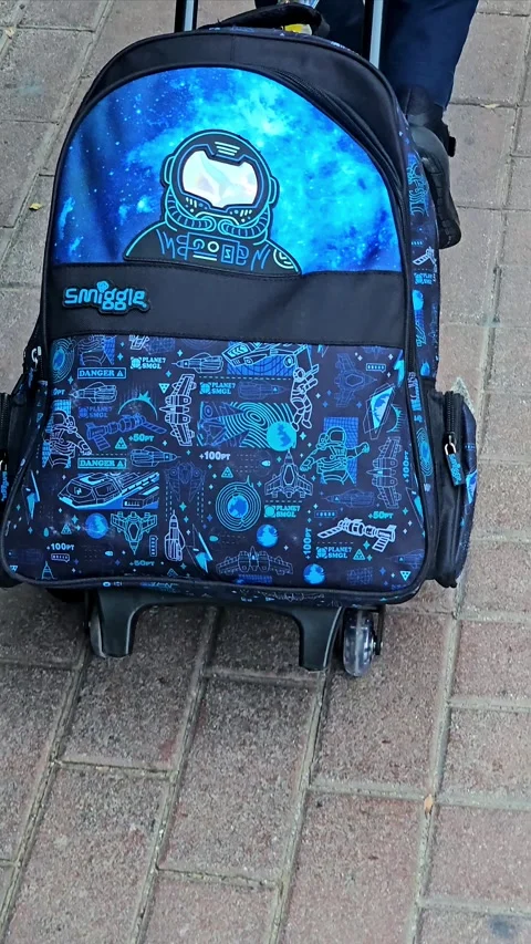 A Smiggle space themed trolley backpack Stock Footage 311767340