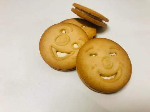 Smile biscuits on white background Stock Photos