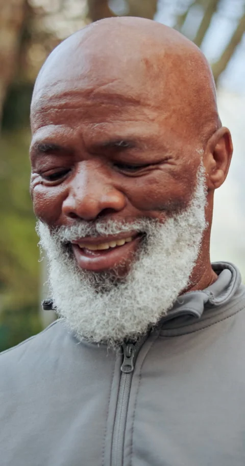 Smile, black man and earbuds in park for fitness, exercise and streaming podcast Stock Footage 340968417